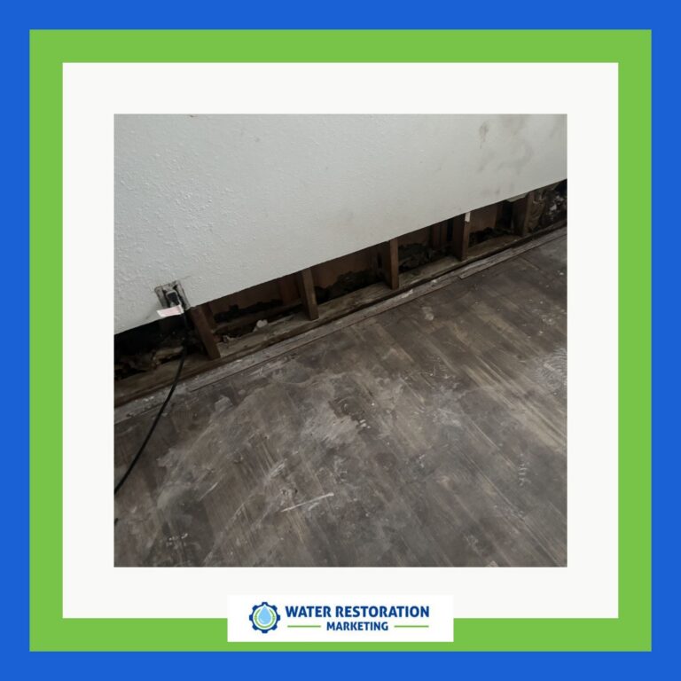 Exposed wall with water damage signs.