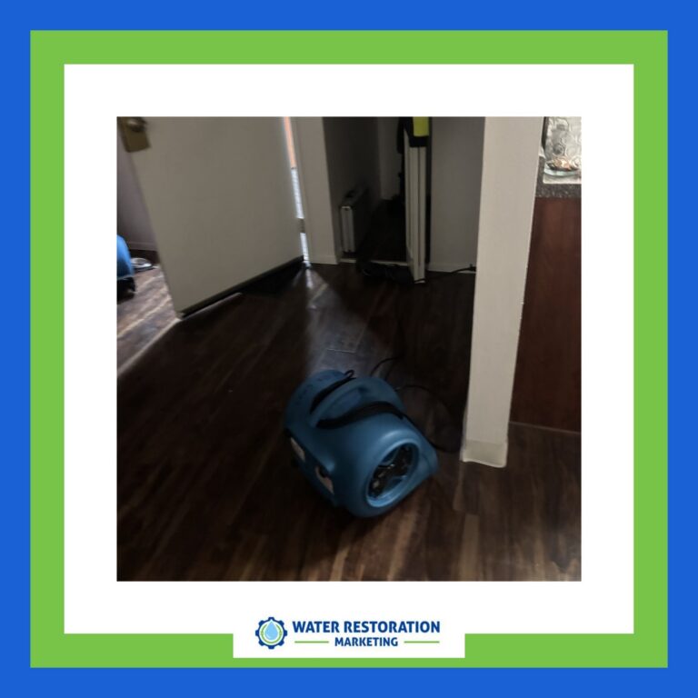 Blue water restoration equipment on floor