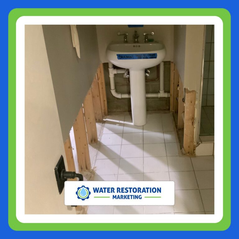Bathroom with exposed plumbing and sink