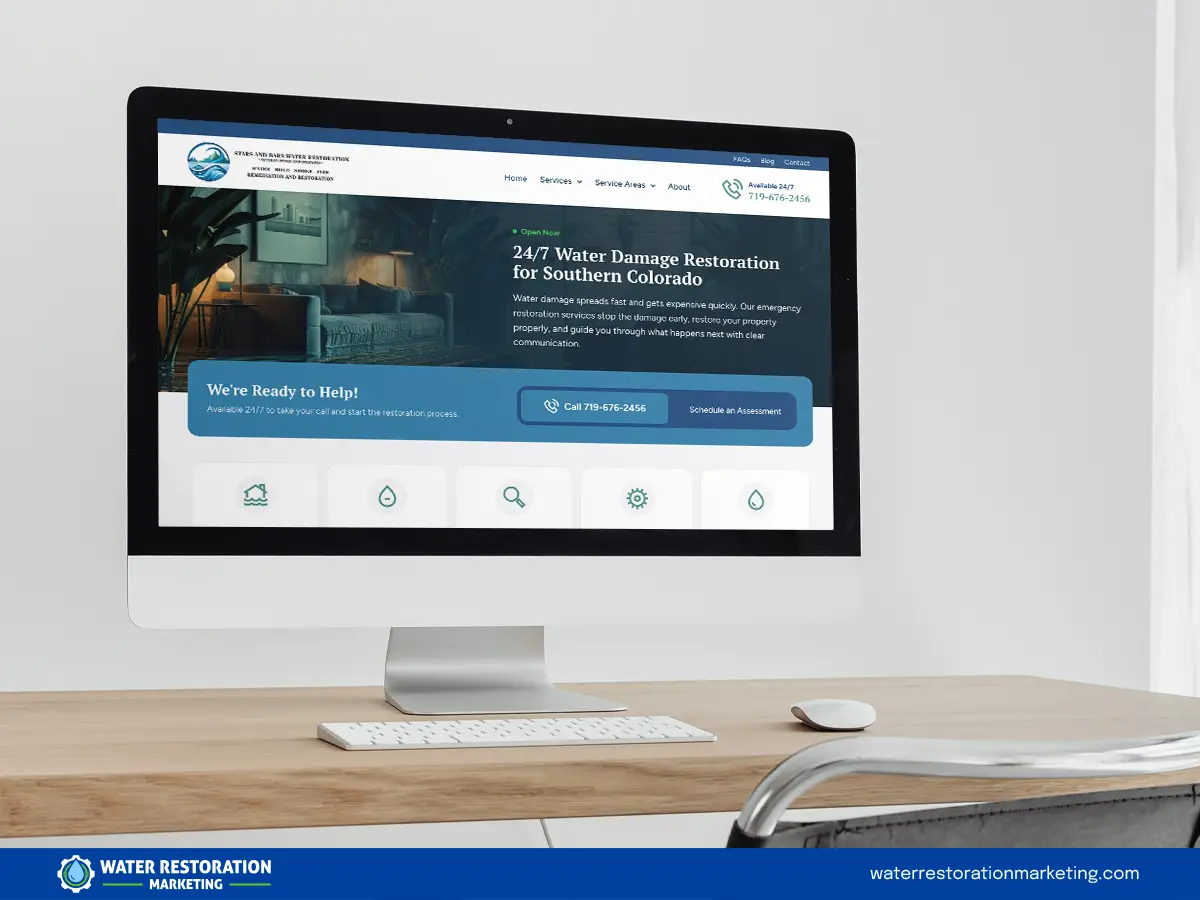 Laptop on a table with client's website homepage pulled up
